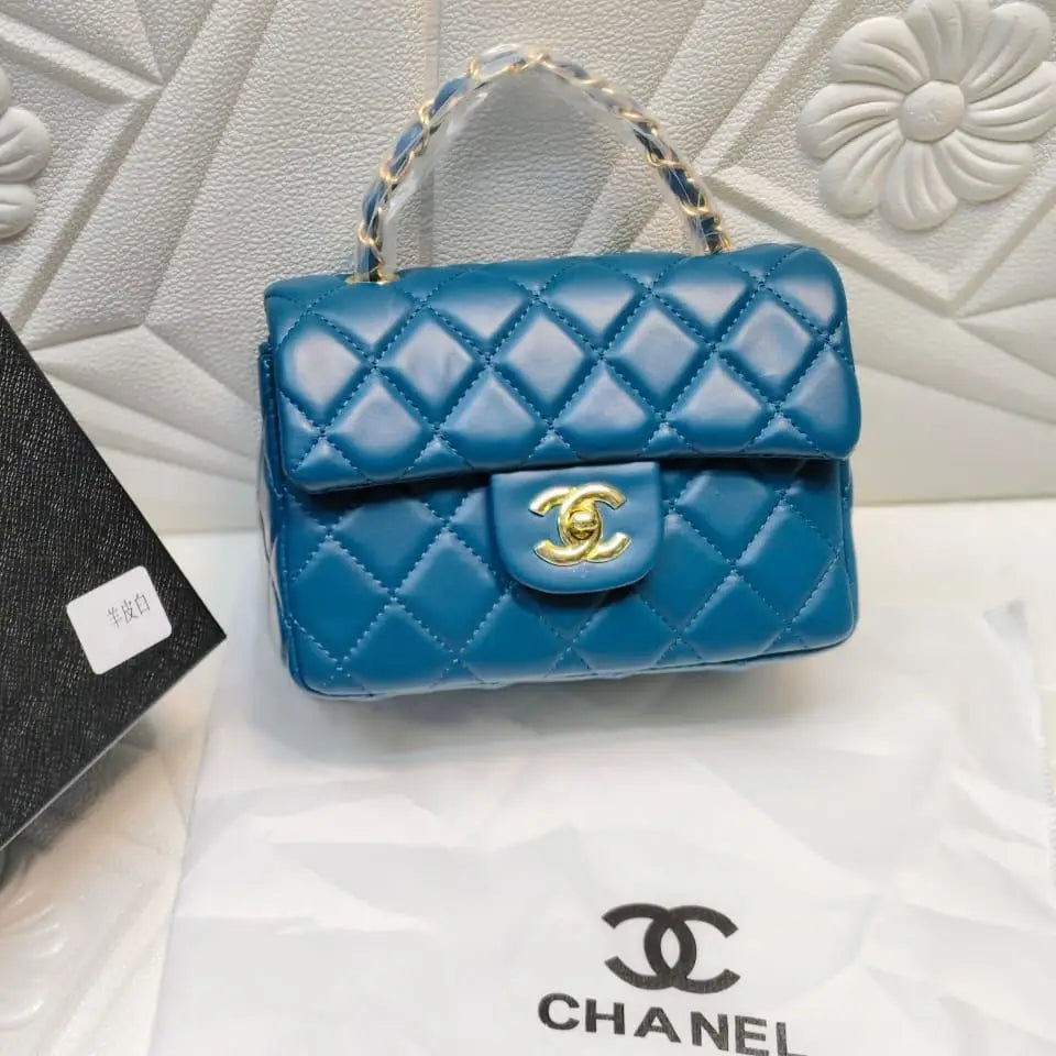 Chanel 23S Top Handle Mini Flap Bag in Black Lambskin with Silver Hardware