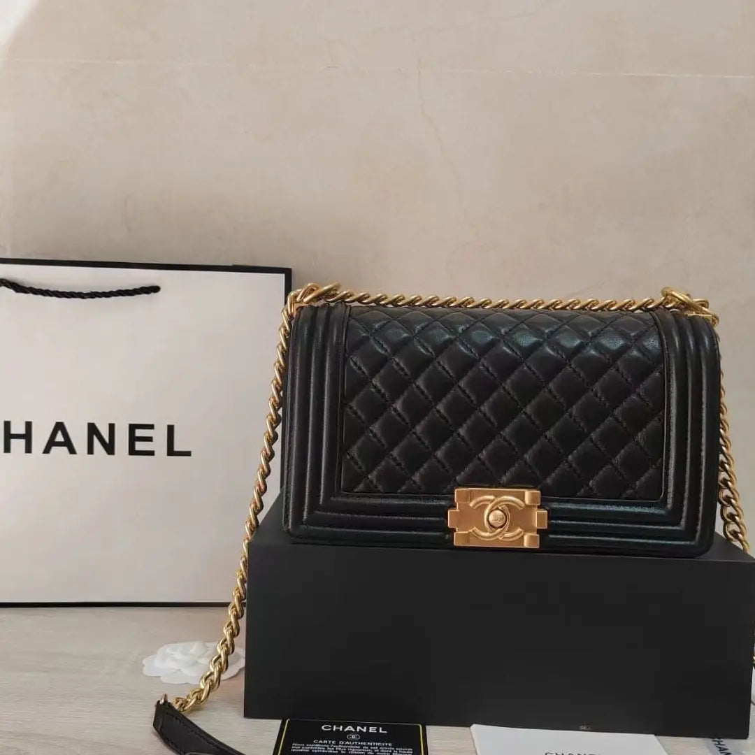 Chanel Boy Bag – Iconic Quilted Design with Silver Chain Strap