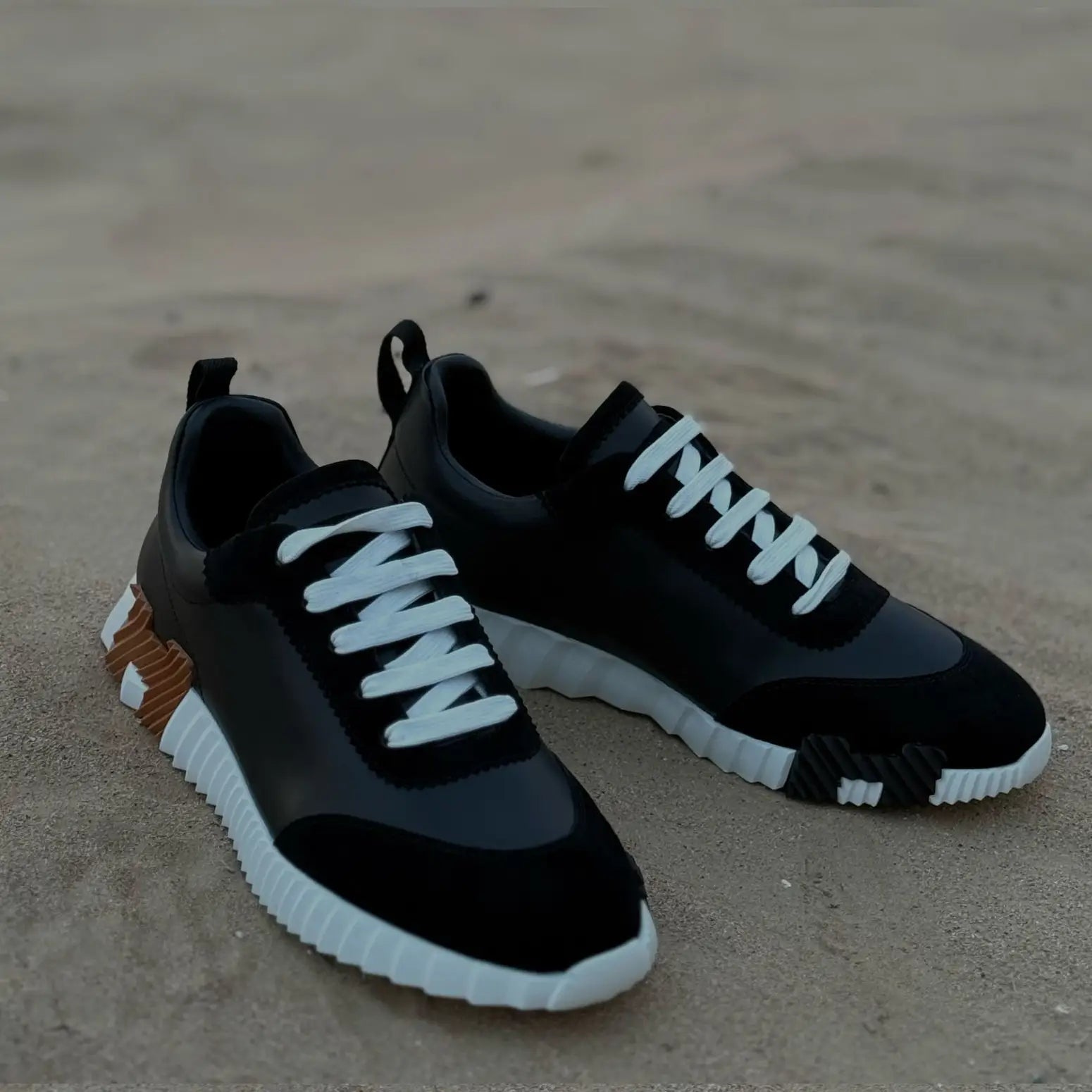 Hermès Bouncing Black Leather & Suede Sneakers